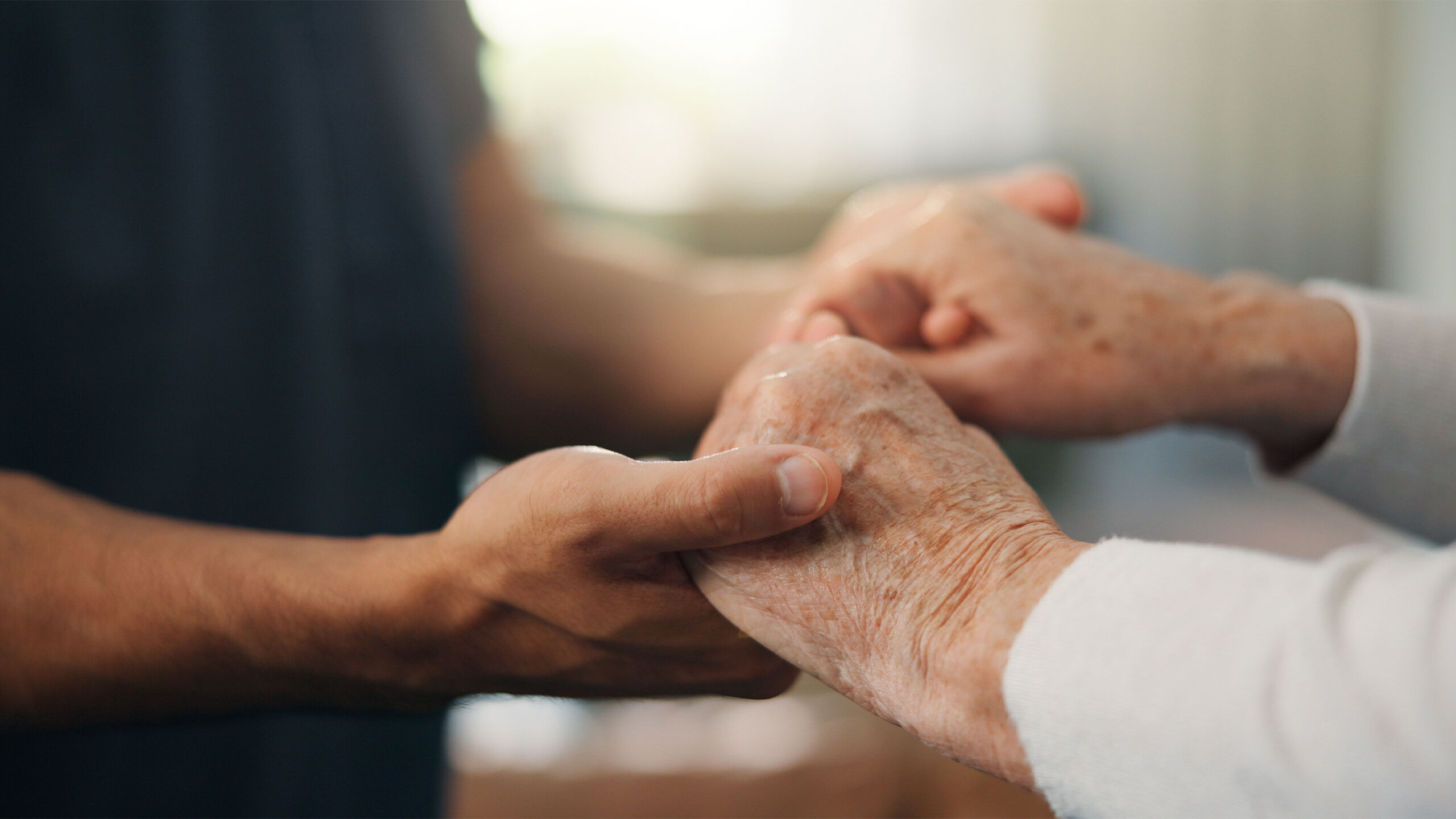 two people holding hands