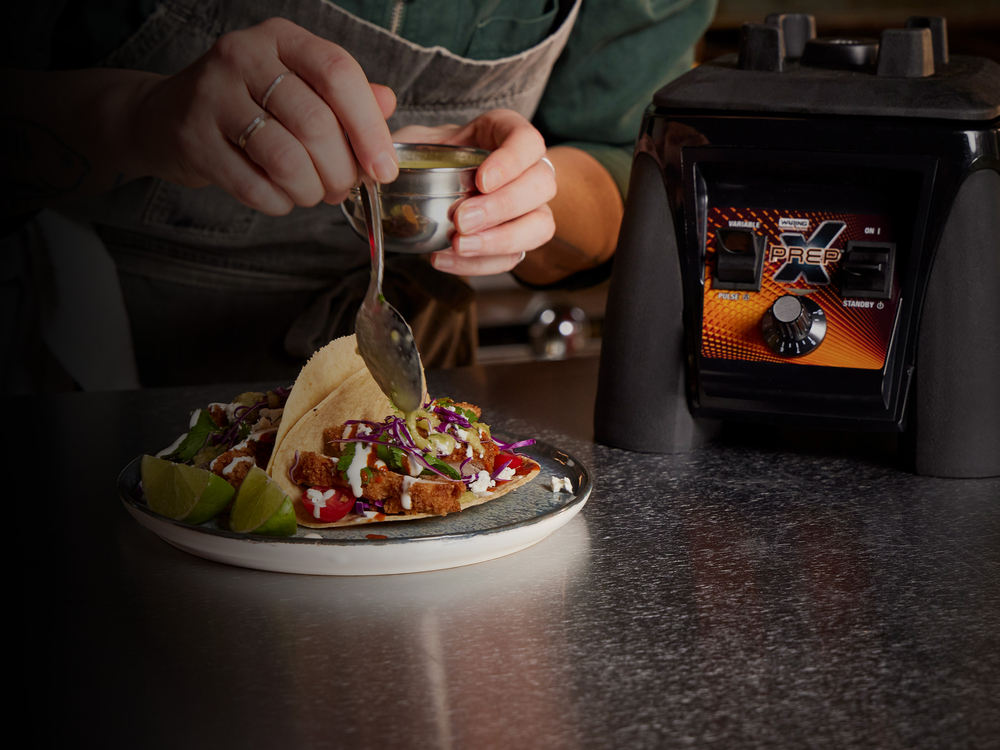 Tacos being prepared on cooktop | Waring